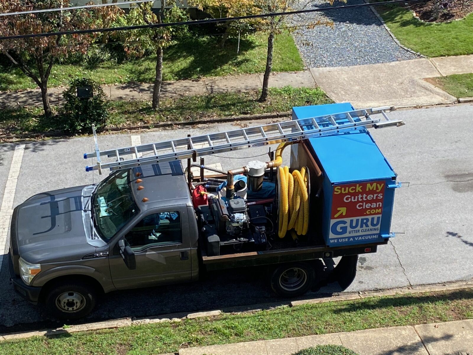 Guru Gutter Cleaning — gutters, at work